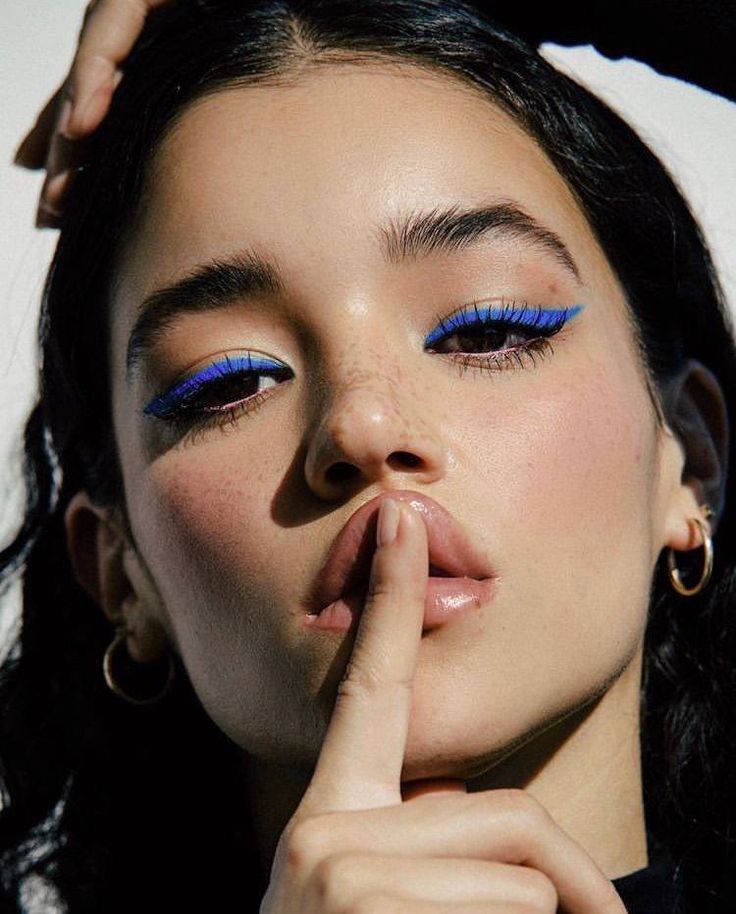 Beautiful person with blue eyeliner
